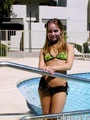 Sexy teen gets all wet in the swimming - Picture 3
