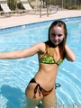 Sexy teen gets all wet in the swimming - Picture 14