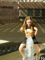 Gorgeous teen plays in the water on a - Picture 1