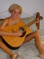 Hot teen gets off playing guitar in the - Picture 5