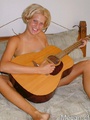 Hot teen gets off playing guitar in the - Picture 6