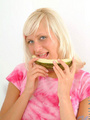 Cute teen eats melon for her photoshoot - Picture 5