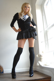 Awesome blonde Elle Parker exposes her perfect body in light blue ling.. - picture 1