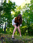 Leggy starlet empties her bladder in the city park
