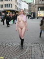 Smart-looking blonde is walking naked in - Picture 5