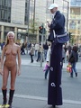 Talk of nude in public lass with stilt - Picture 1
