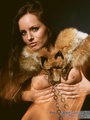 Naughty ertoic babe in fur cape looking - Picture 3