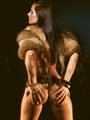 Naughty ertoic babe in fur cape looking - Picture 4