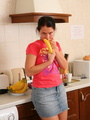 Dark haired young housewife with bushy - Picture 1