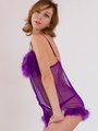 Brunette babe in purple lingerie slowly - Picture 2