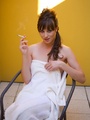 Brunette erotic smoker with perfect - Picture 2