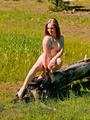 Hot girl in beads posing nude outdoors - Picture 8
