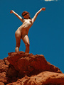 Hot Elaine in sunglasses and blue skirt - Picture 12