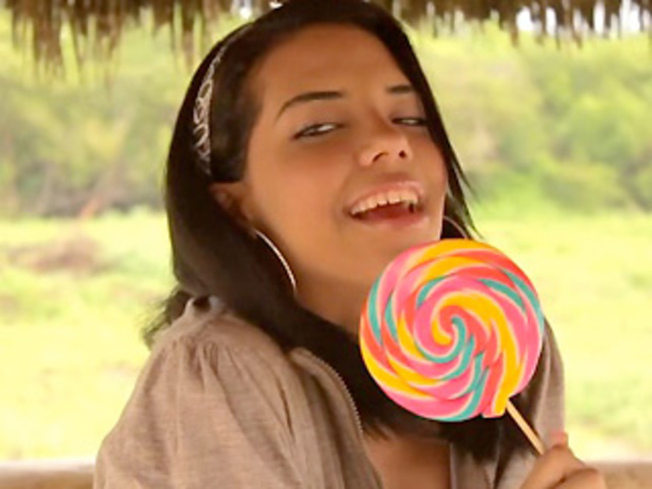 920px x 690px - Nasty latina girl with a lollipop undresses to show her sexy ...