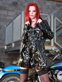 Bodacious red chick in a black trench - Picture 2
