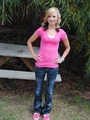 Petite blonde teen in a pink T-shirt - Picture 1