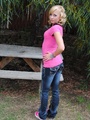 Petite blonde teen in a pink T-shirt - Picture 2