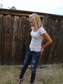 Nasty blonde teen girl lifts her top to - Picture 2