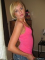 Ponytailed blonde in a pink vest gets - Picture 3