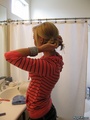 Hot petite blonde puts on her make-up in - Picture 1