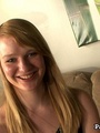 Blonde teen in pantyhose tears them to - Picture 1