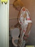 A slutty blonde bitch demonstrates how enjoyable  taking a piss in the