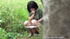 Shy Japanese girl in a khaki dress was caught pissing