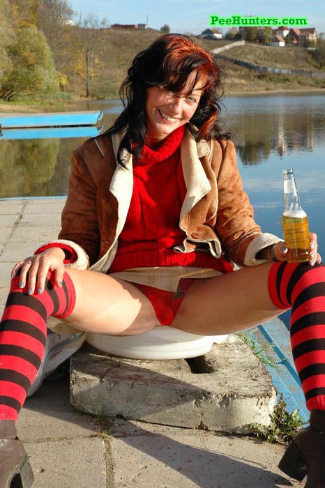 See a cute teen redhead pissing at the stadium - XXXonXXX - Pic 2