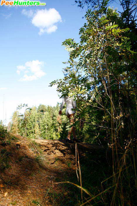 Naughty blonde pisses into a sandpit in forest - XXXonXXX - Pic 15
