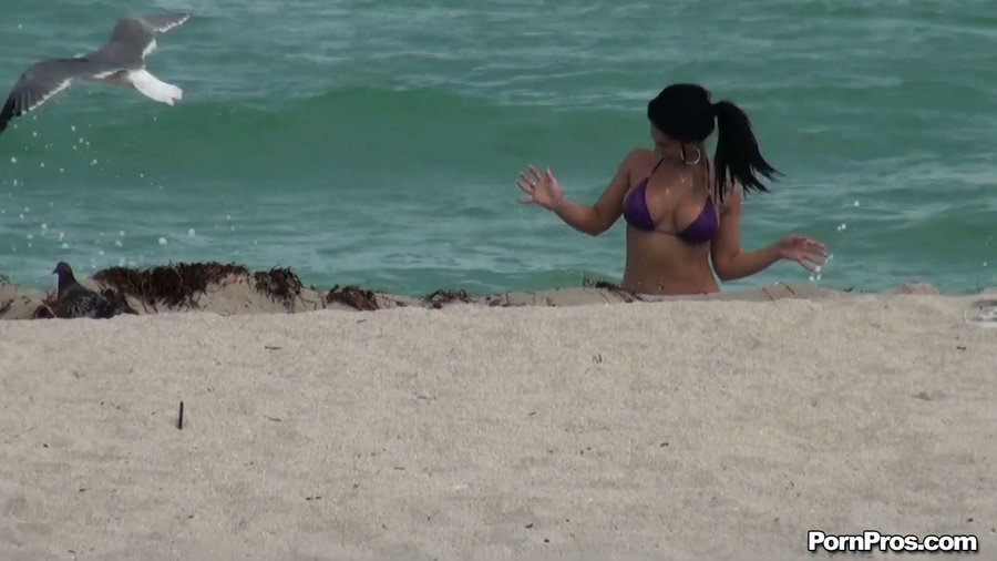 While on the beach, some public sex angel ripped her violet bra off her  boobs. Picture 3.