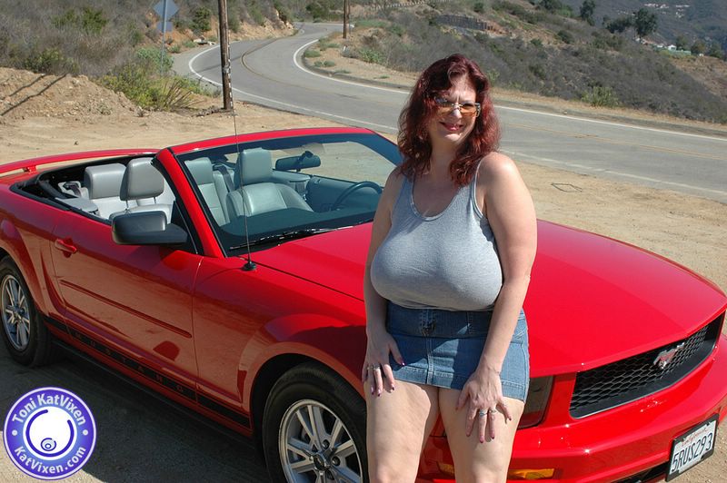 Amateur Big Tits Car - Hot Toni KatVixen posing by a red car - XXX Dessert - Picture 1