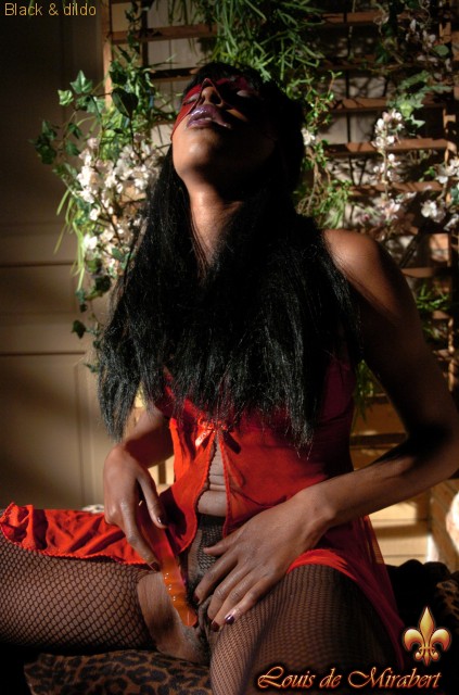 Lustful ebony babe in a red mask and fishne - XXX Dessert - Picture 1