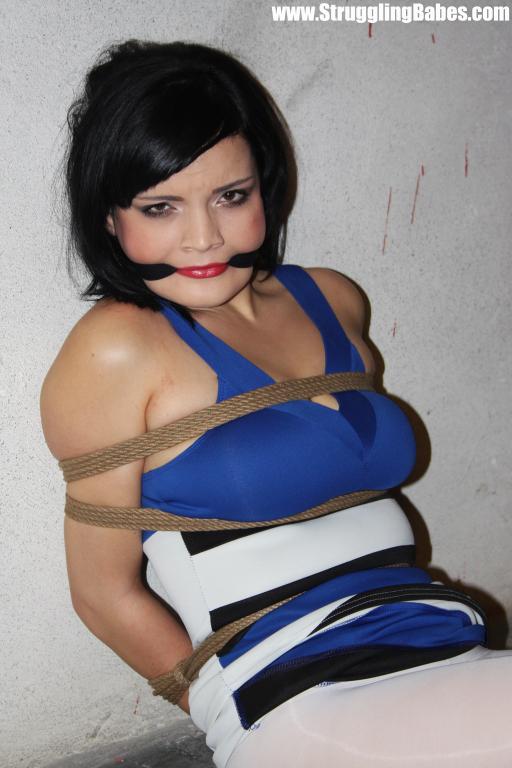 Hot brunette babe in a blue top with her ti - XXX Dessert - Picture 5