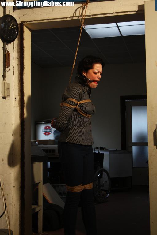 Brunette gagballed chick in clothes pendula - XXX Dessert - Picture 3