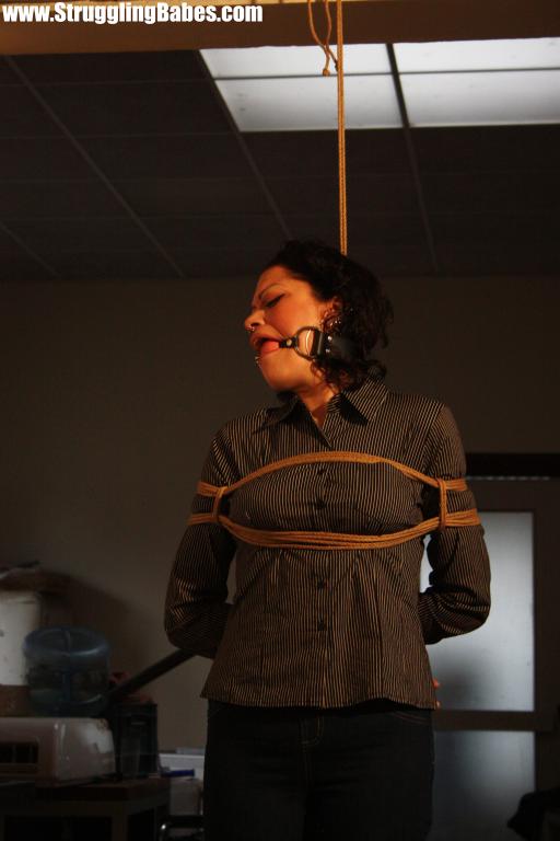 Brunette gagballed chick in clothes pendula - XXX Dessert - Picture 6