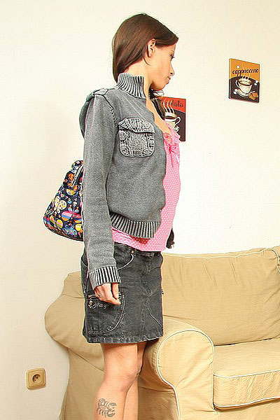 Skinny brunette teen in a pink top seduces  - XXX Dessert - Picture 1