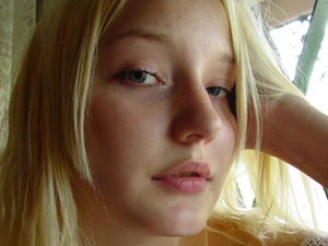 Nasty red teen in glasses and a blue top shot herself on her mobile - XXXonXXX - Pic 4