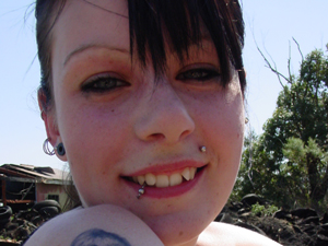 Lovely ponytailed brunette teen with piercing taking her own picture - XXXonXXX - Pic 1