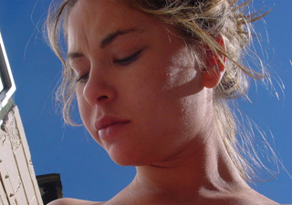 Blonde teen gal in a white shirt shoot herself on the bed - XXXonXXX - Pic 1