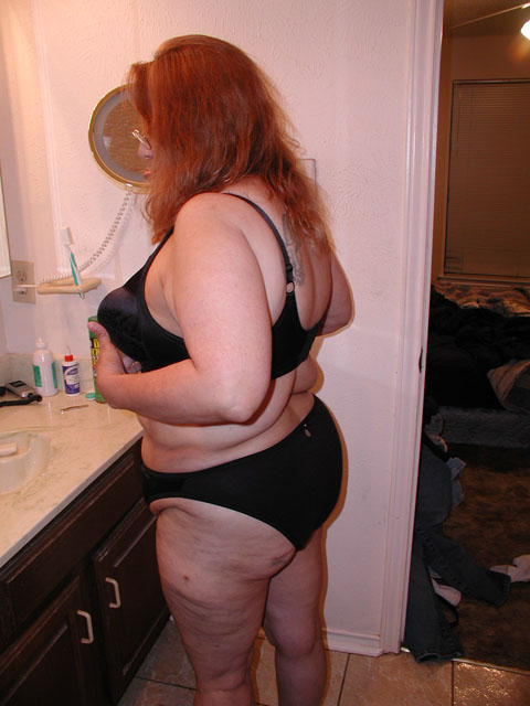 Big red BBW in atlas black lingerie riding thick meat - Picture 3