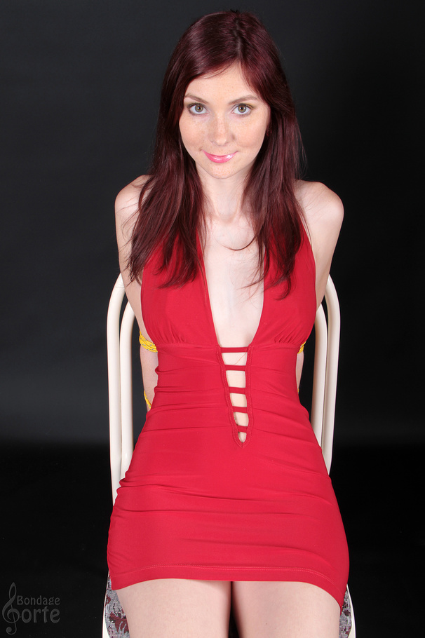 Hot sexy temptress in red is tied to a chai - XXX Dessert - Picture 2