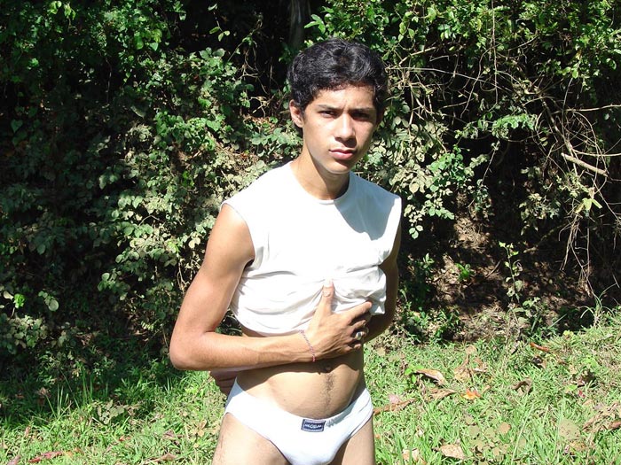 A lusty dark latino twink poses nude for the camera showing the humongous size of his uncut dick and the cum he unloads - XXXonXXX - Pic 2