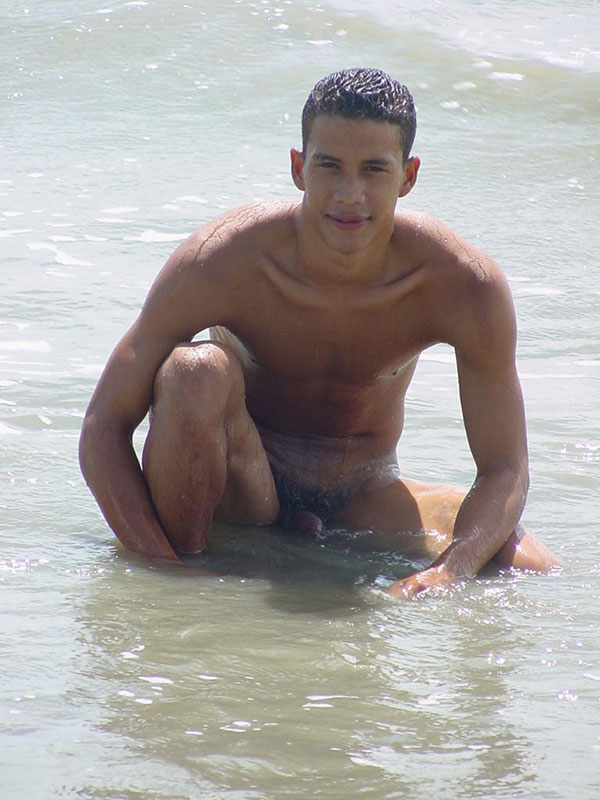 A lusty bronzed latino twink poses nude for the camera showing the extra large size of his uncut cock and the cum he unloads - XXXonXXX - Pic 6