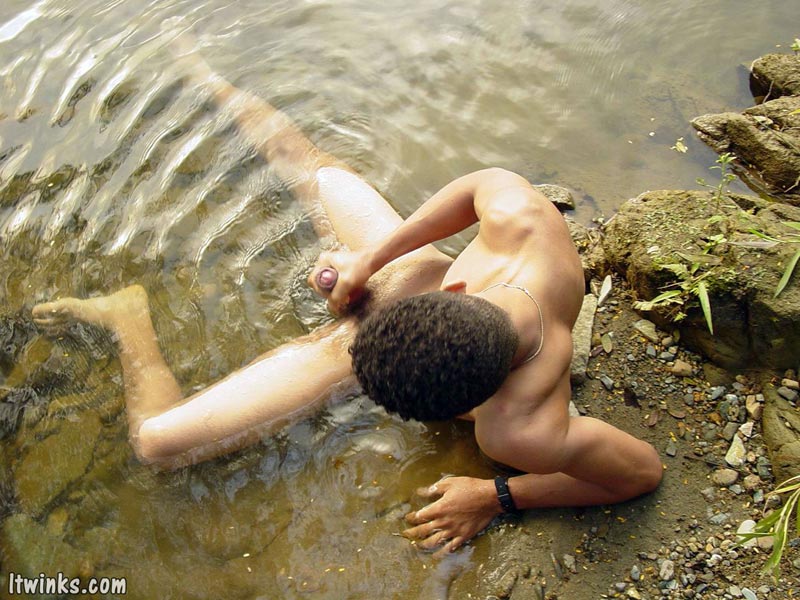 Frolicking in the water is a nude dark skinned horny latino enjoying whacking of his extra large cock and spewing jizz on himself - XXXonXXX - Pic 4