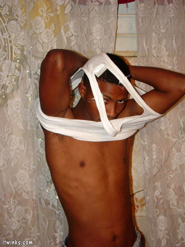 A randy and very dark young latino hunk displays his already heavily aroused and meaty dark uncut cock and  whacks off - XXXonXXX - Pic 11