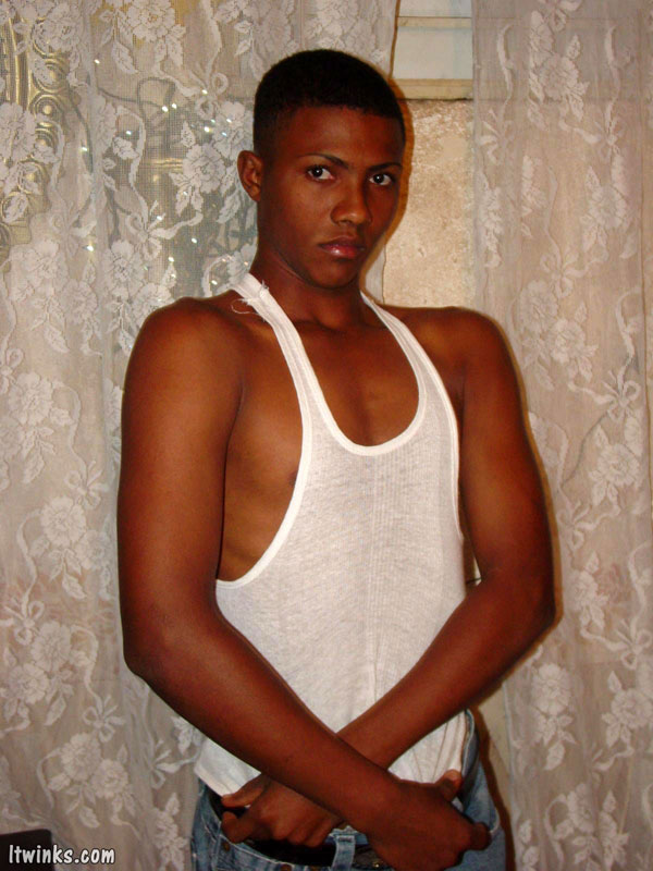 A randy and very dark young latino hunk displays his already heavily aroused and meaty dark uncut cock and  whacks off - XXXonXXX - Pic 13