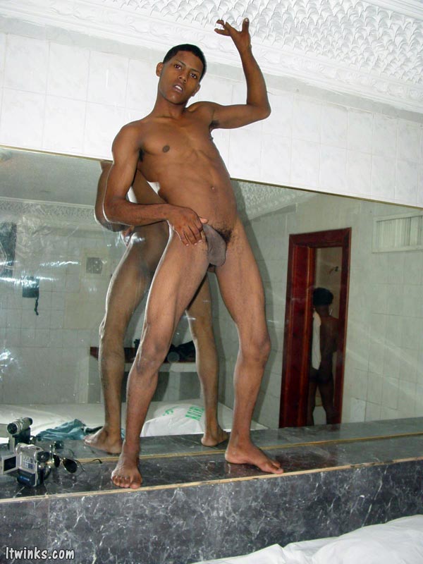 A lewd latino twink poses nude in different areas of a room displaying and lovingly handling a huge cock until he blasts his cum - XXXonXXX - Pic 6