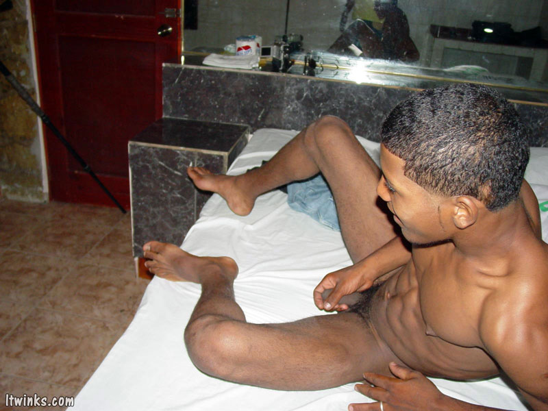 A lewd latino twink poses nude in different areas of a room displaying and lovingly handling a huge cock until he blasts his cum - XXXonXXX - Pic 8