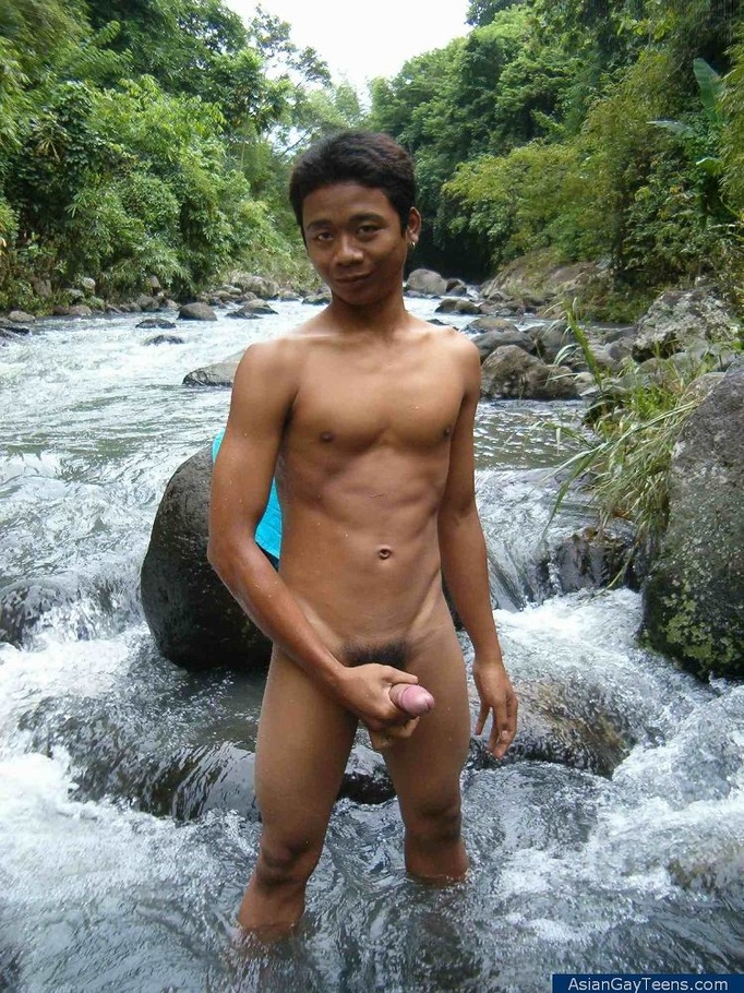 Nature lover guy gets nude by rocks and water and jerks of his cock to spray cum - XXXonXXX - Pic 3