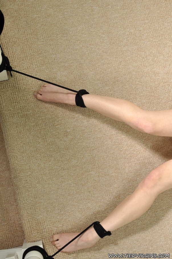 Very naked red haired beauty is on the floor bound to spread eagle to furnitures while her fat lipped cunt is exposed - XXXonXXX - Pic 9